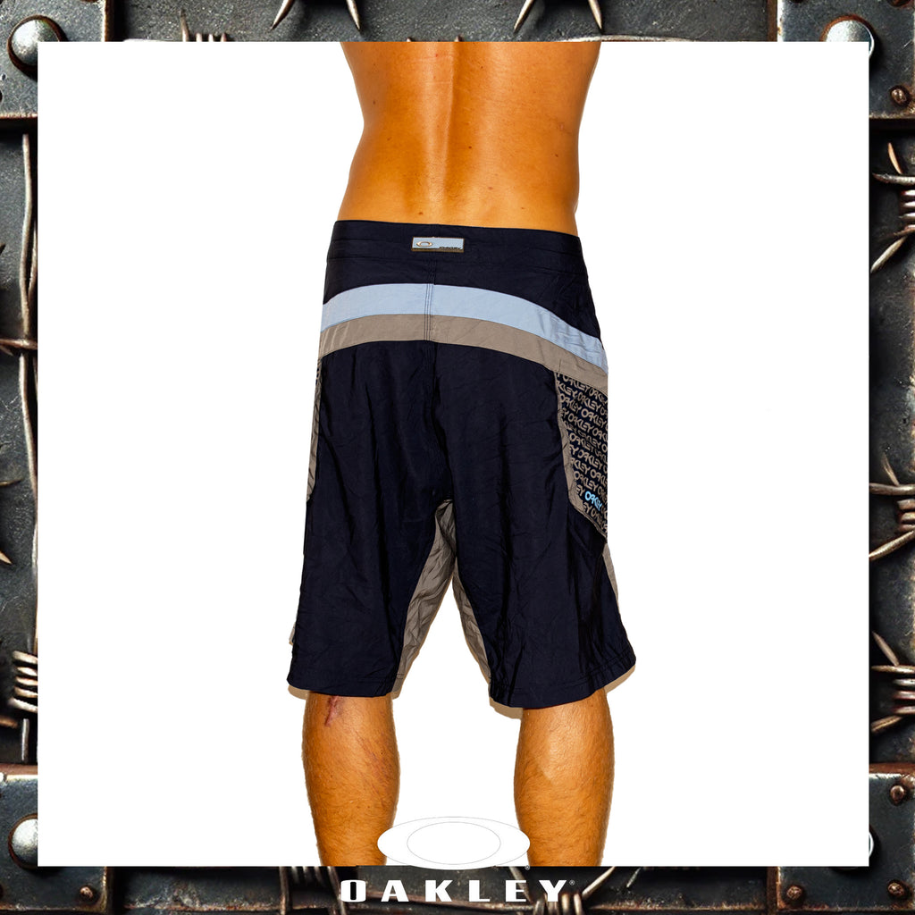 1990's Oakley "Silver Tag" Vault Tech Boardies (34")